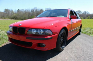 Illustration for article titled For $9,900, This 1999 BMW 540i Lets You Stick It To The Man